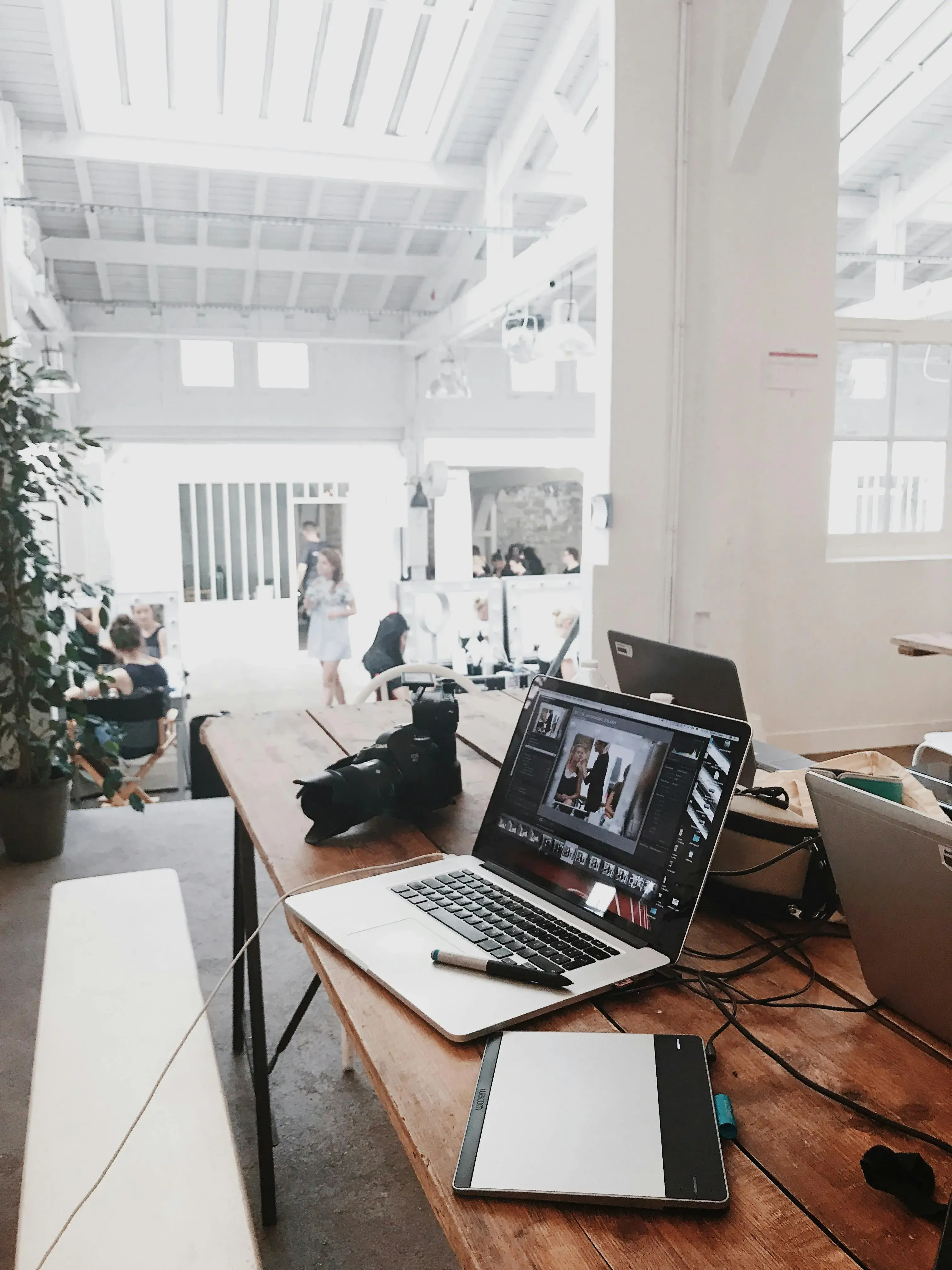 Desk with creative tools and computer